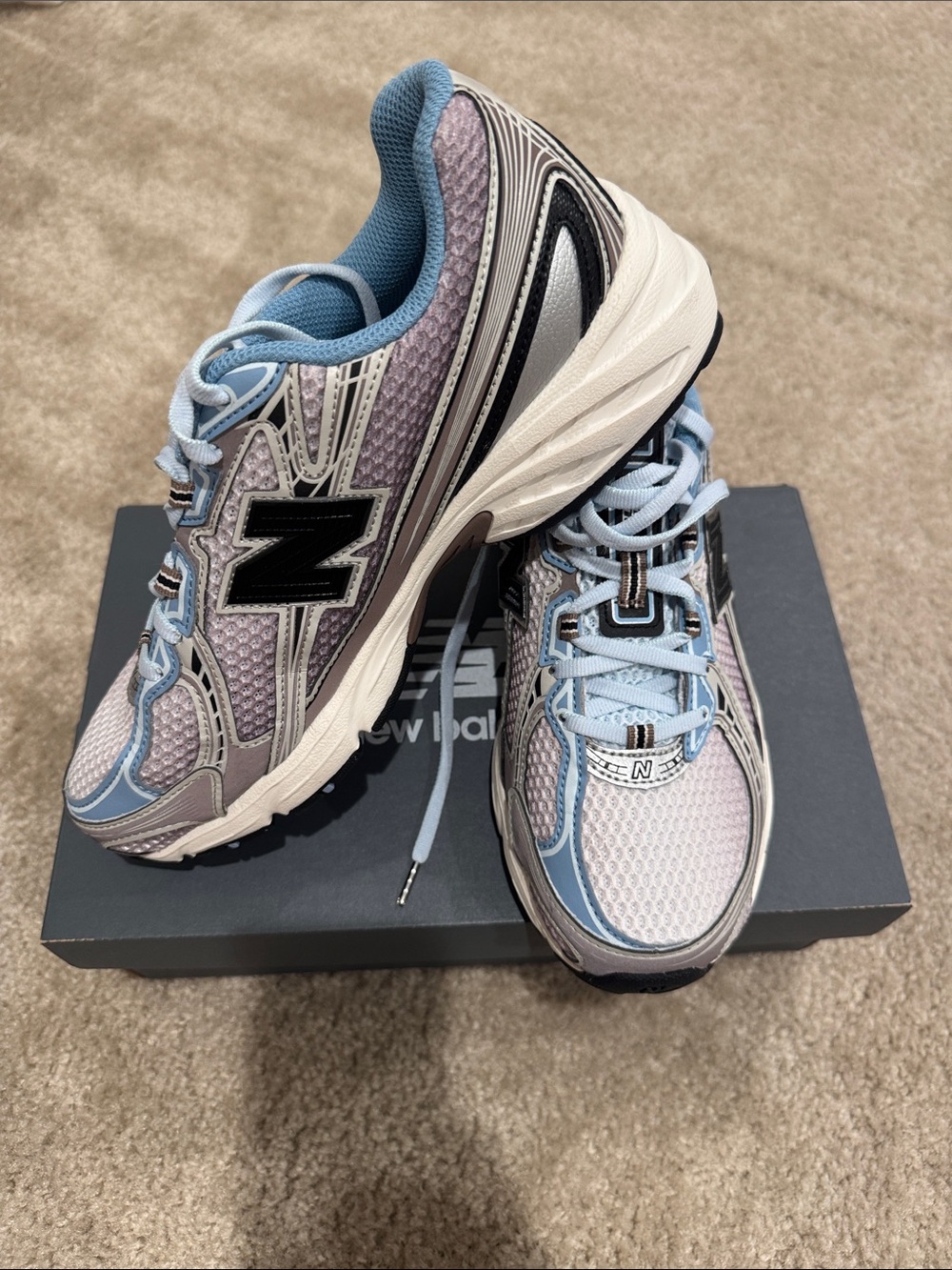 New Balance Women’s Sneakers in Light Blue and Gray with Black Logo